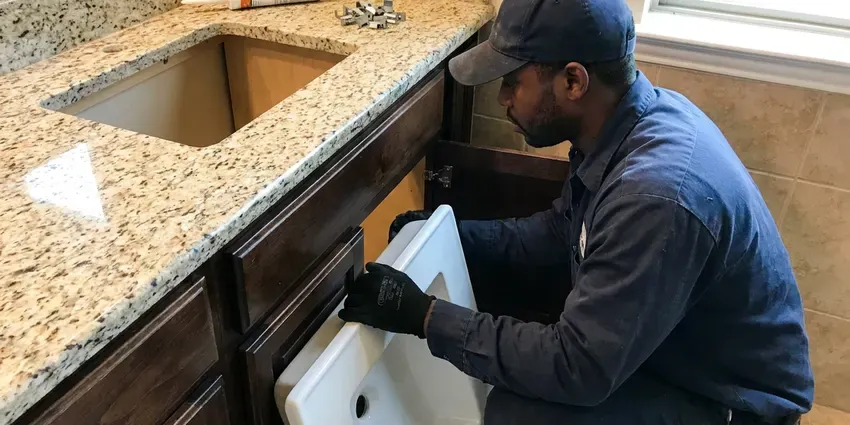 HWR Plumbing technician providing toilet replacement in Sioux Falls
